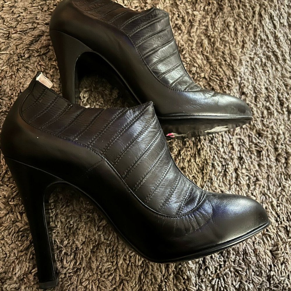 Authentic Chanel Paneled Black leather Bootie